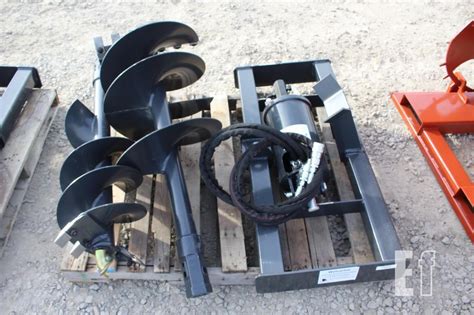 wolverine skid steer post hole digger|wolverine skid steer attachments.